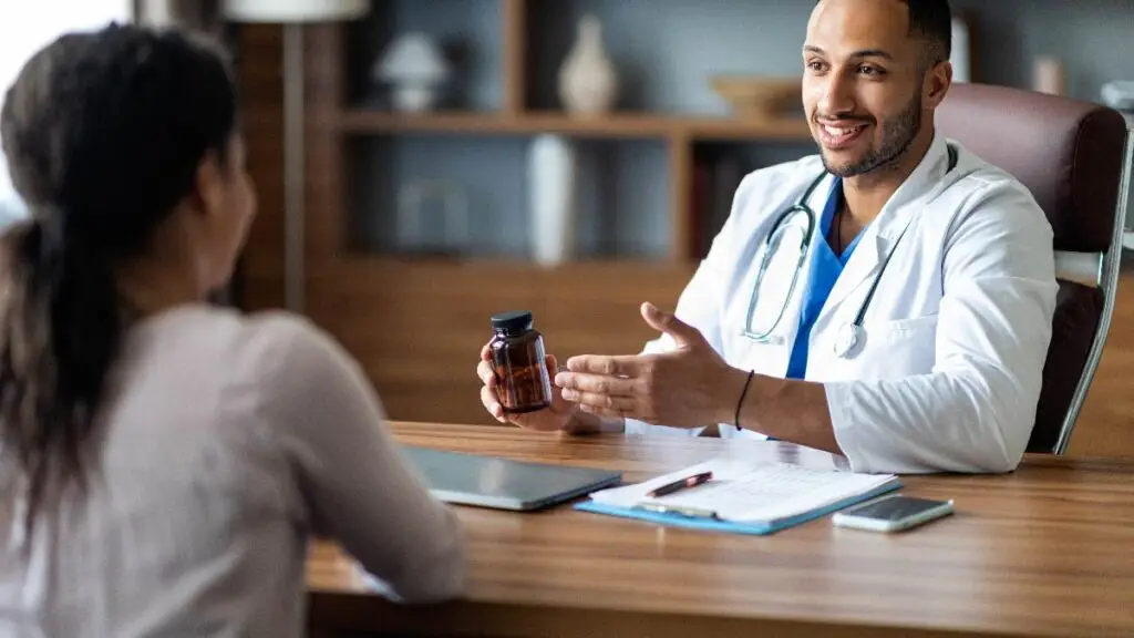 Doctor speaking to client